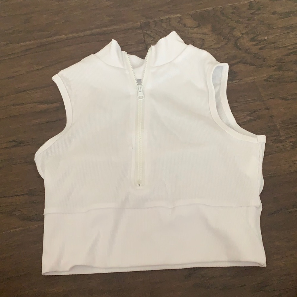 white zip up tank top